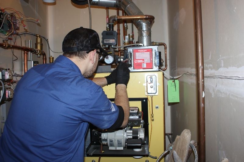 Heater Technician Performing Heater Repair